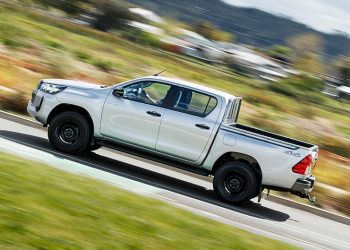 Toyota Hilux driving on road