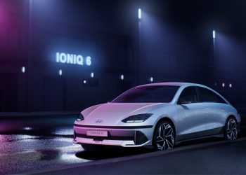 Hyundai Ioniq 6 at night time surrounded by ambient lighting