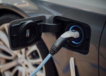 Electric car charging with cable plugged in