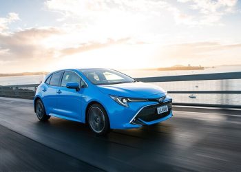 Toyota Corolla ZR Hybrid driving across Harbour Bridge in Auckland