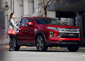 Mitsubishi ASX with lady opening door