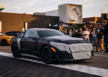 Seventh-generation Ford Mustang under camouflage front three quarter view