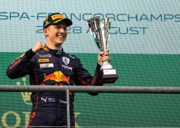 Liam Lawson holding up first place trophy in Formula 2 Sprint Race in Belgium