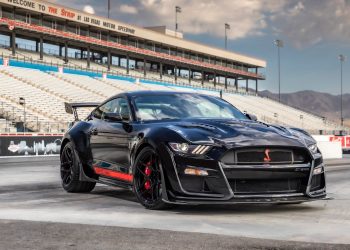 Shelby Mustang GT500 Code Red front three quarter view at drag strip