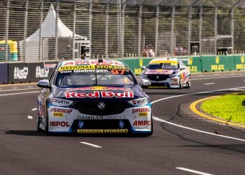 Shane van Gisbergen Holden Commodore Supercar front view driving on track