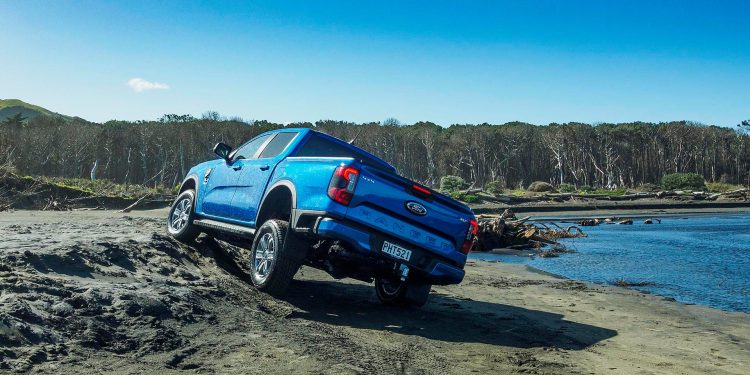 Ford Ranger at Muriwai Beach under a blue sky