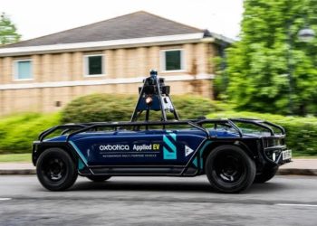 Applied EV off-road autonomous vehicle side view driving