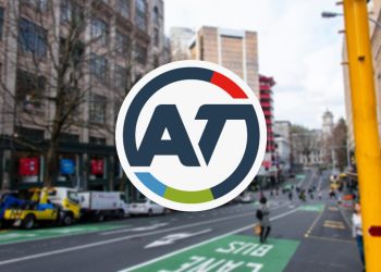 Auckland Transport logo over city background