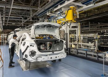 Mazda manufacturing plant with person on production line