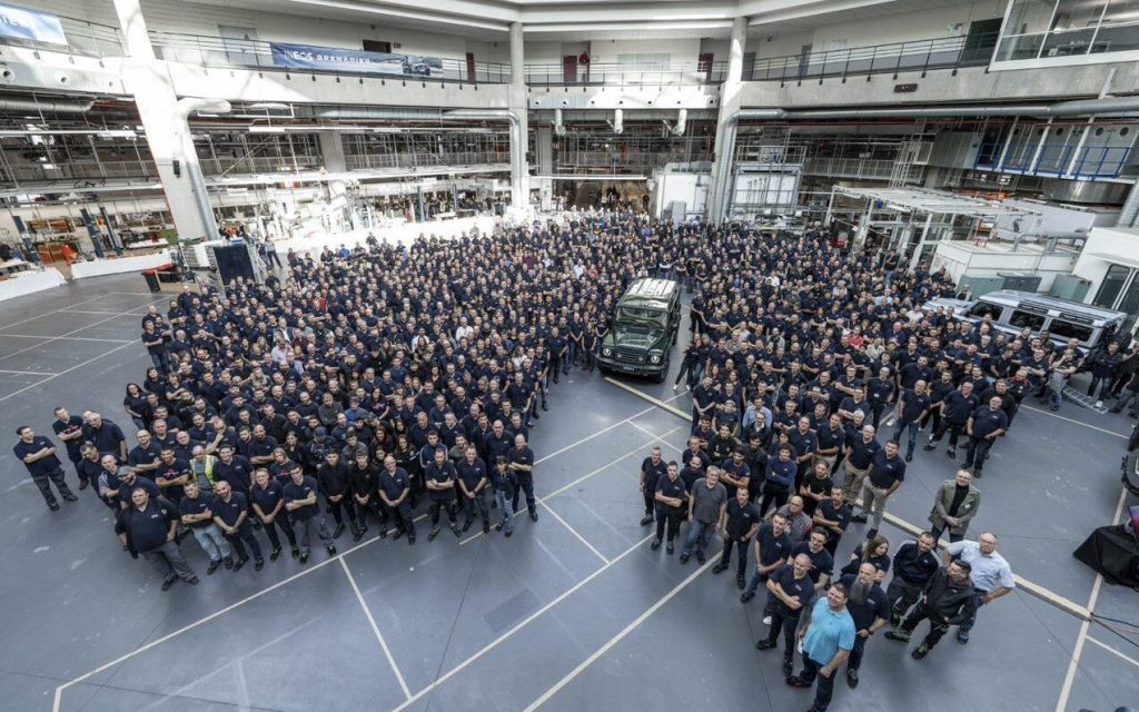 Ineos factory with workers standing around Grenadier