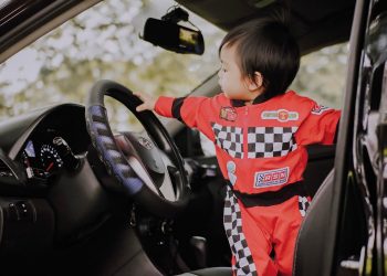 little kid driving car