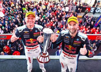 Shane van Gisbergen and Garth Tander holding up Bathurst 1000 trophy