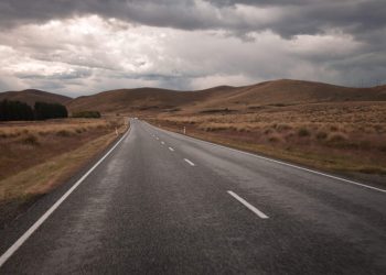 New Zealand road by hills