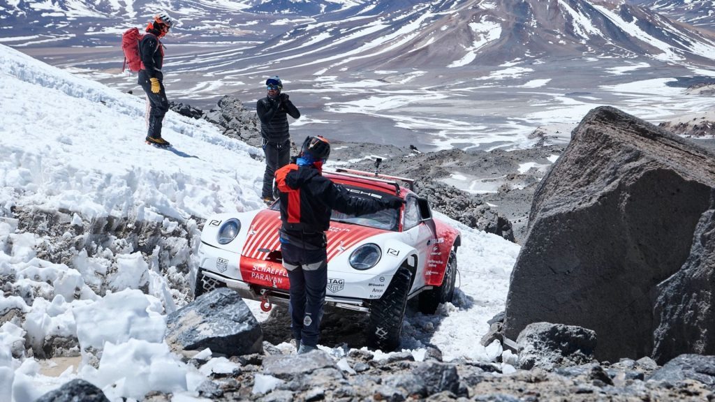 Porsche 911 off-road front view on volcano