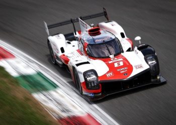 Brendon Hartley's Toyota GR010 front three quarter view racing on track