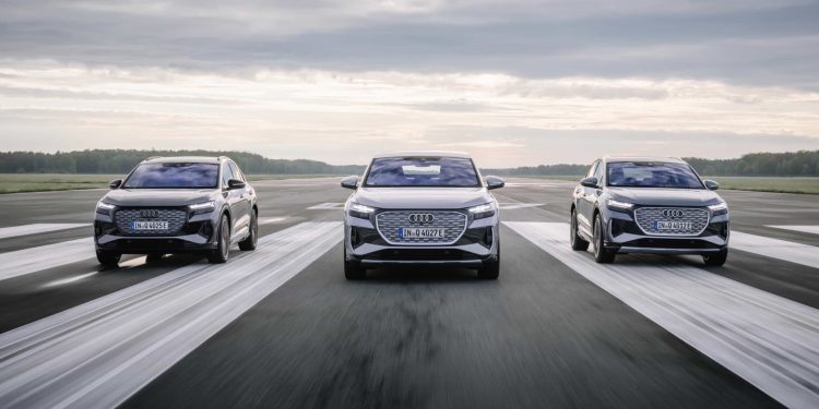 Audi Q4 e-tron lineup driving on runway