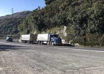 Trucks driving up hill in New Zealand