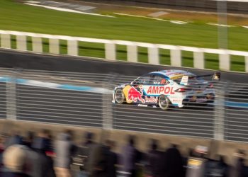 Holden ZB Commodore Supercar racing on track panning view