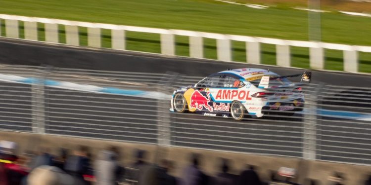 Holden ZB Commodore Supercar racing on track panning view