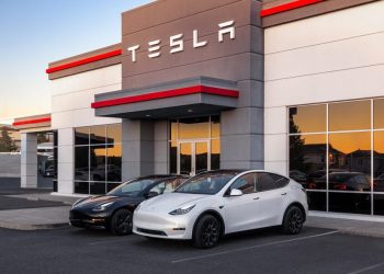 Tesla Model 3s outside dealership