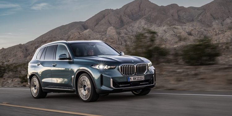 2024 BMW X5 driving in mountains