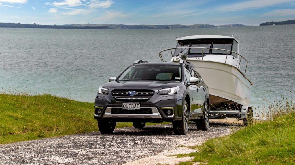 Subaru Outback XT Turbo towing boat