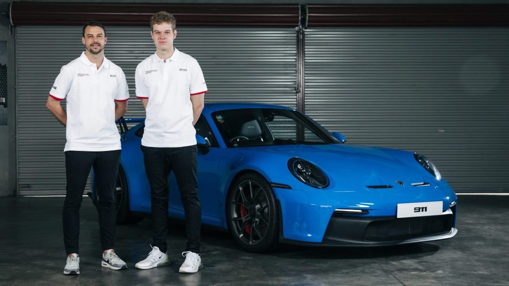 Marco Giltrap and Earl Bamber standing next to Porsche GT3