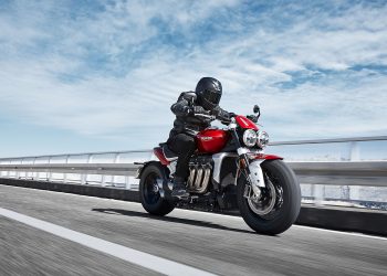 Triumph Rocket 3 front action rolling shot, on a motorway bridge