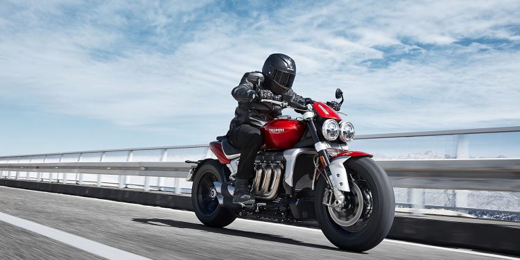 Triumph Rocket 3 front action rolling shot, on a motorway bridge