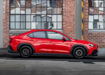 Subaru WRX 2.4T AKA side profile next to old building