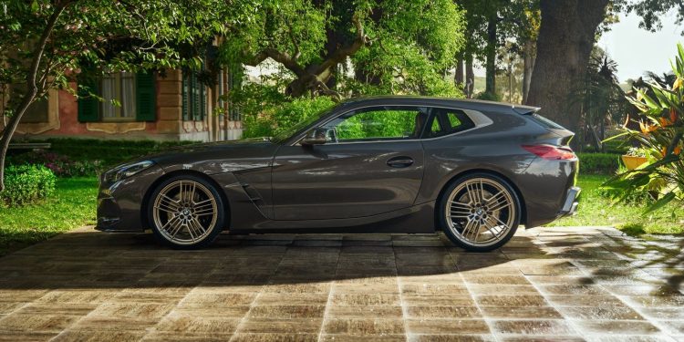 BMW Concept Touring Coupe side profile in courtyard