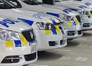 Multiple New Zealand Police cars in a line