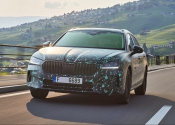 Skoda Superb driving along mountain road