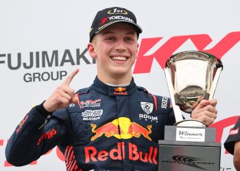 Liam Lawson holding winning trophy at Fuji Speedway Super Formula round 2023