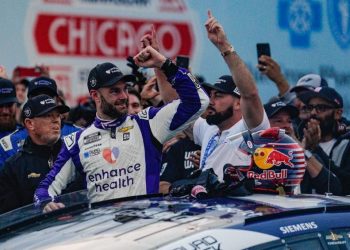 Shane van Gisbergen celebrating NASCAR win in Chicago