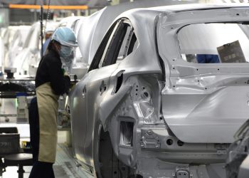 Person working on Toyota production lie