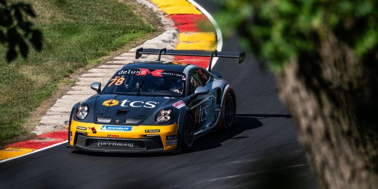 Porsche Carrera Cup car racing around corner in America