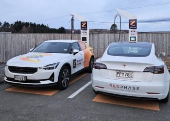 Two electric cars charging at Z Energy station