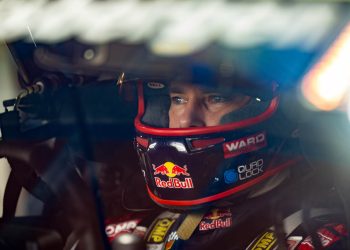 Shane van Gisbergen sitting in Supercar with helmet on