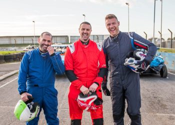 Top Gear presenters Chris Harris, Paddy McGuinness, and Freddie Flintoff in racing overalls