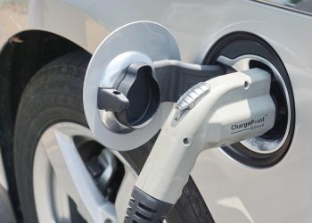 EV charger plugged into car