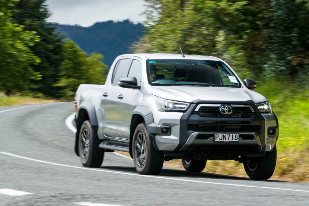 2023 Toyota Hilux SR5 Cruiser driving around corner on country road