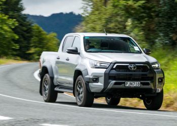 2023 Toyota Hilux SR5 Cruiser driving around corner on country road