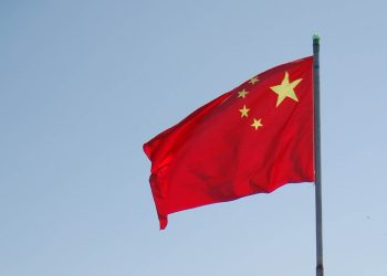 Chinese flag blowing in the wind