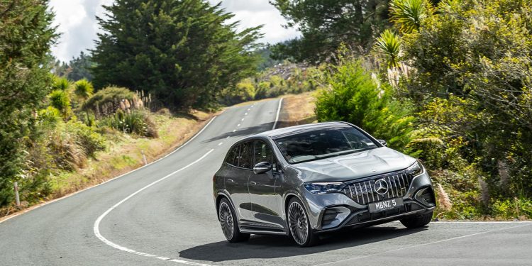 Mercedes-AMG-EQE-53 cornering, showing the front quarter angle of the silver car