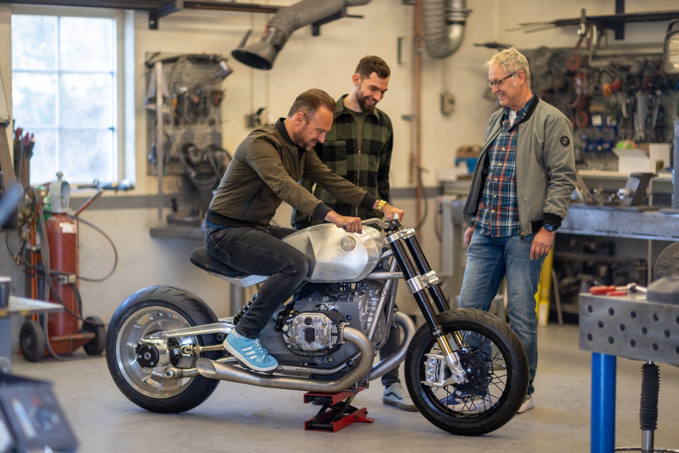 BMW Motorrad guys enjoy their almost finished creation.