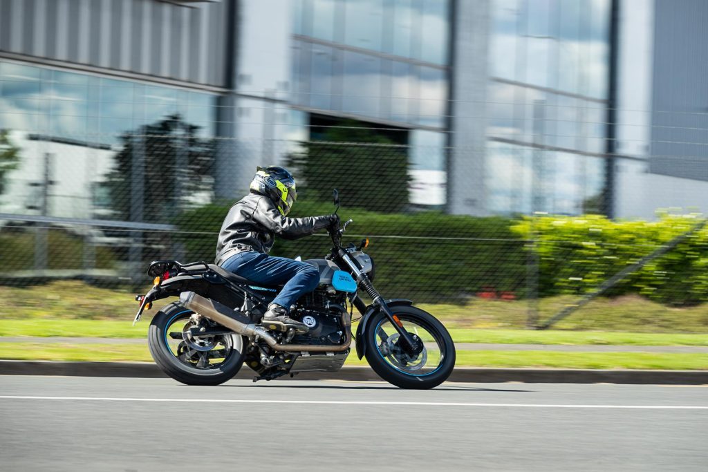 Side panning shot of the Royal Enfield Scram 411 cornering