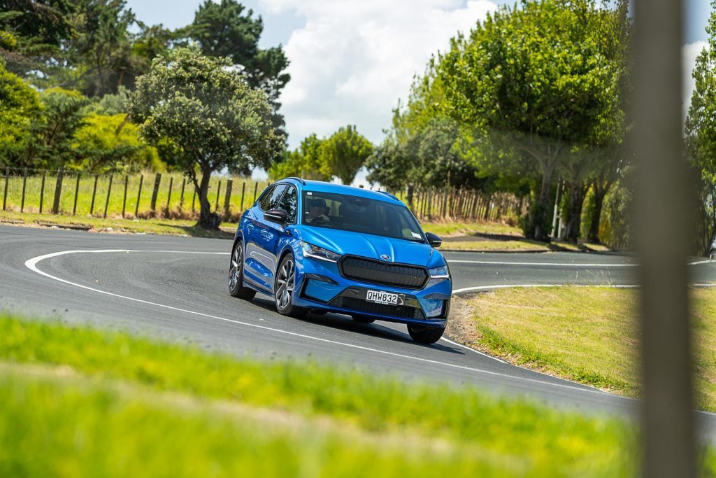 Skoda Enyaq Sportline 80 in blue, cornering at pace