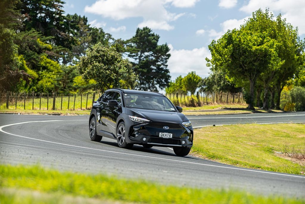 Subaru Solterra in black cornering shot