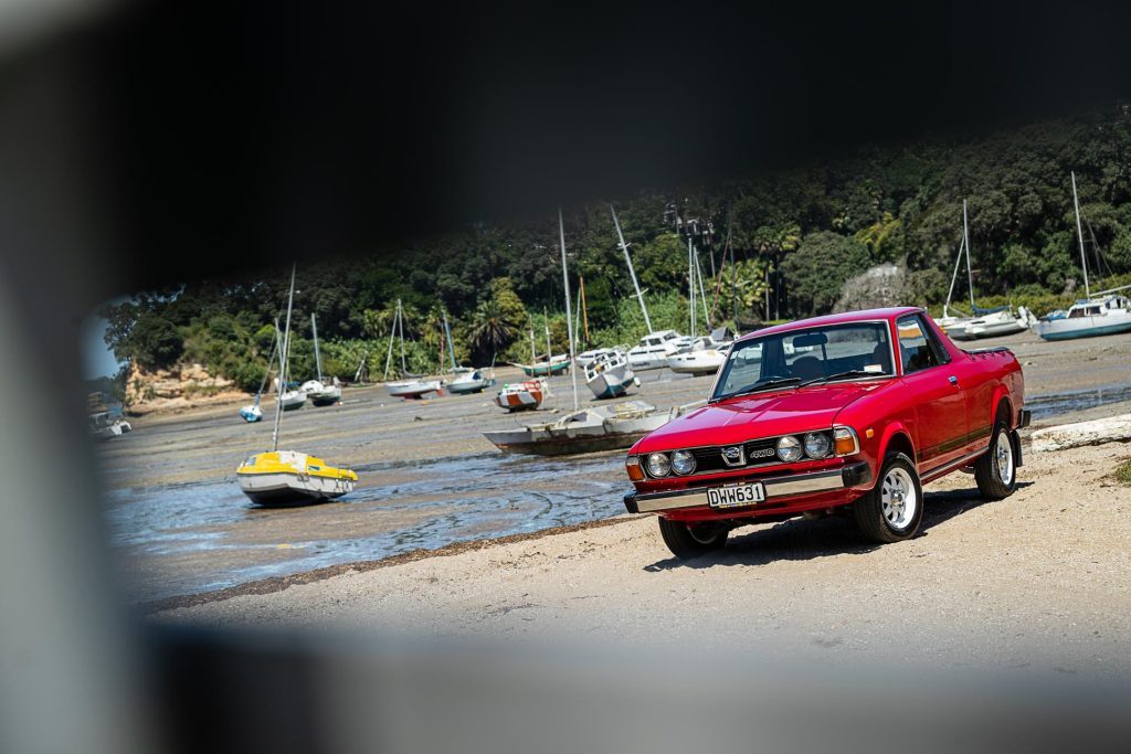 Front quarter shot of the Subaru Brumby or BRAT, framed on a beach